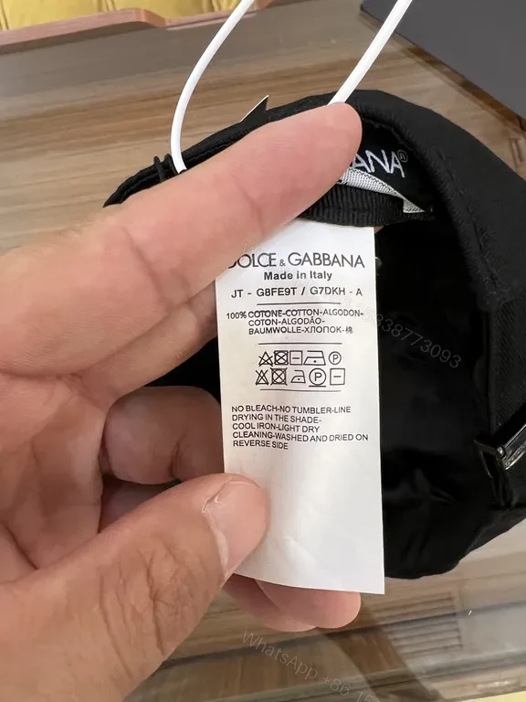 View 7 of Black Cotton Cap by Dolce & Gabbana â€“ Minimal Luxury Headwear