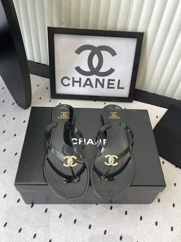 Black Leather Plastic Sandals Classic Gold Chanel Logo Sandals — view 1