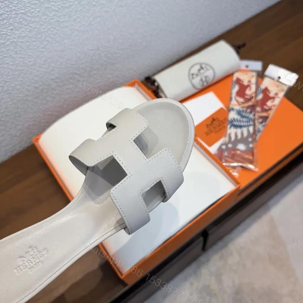 View 8 of White Leather Hermès-Style "H" Sandals - Minimalist, Modern, Flat Slide
