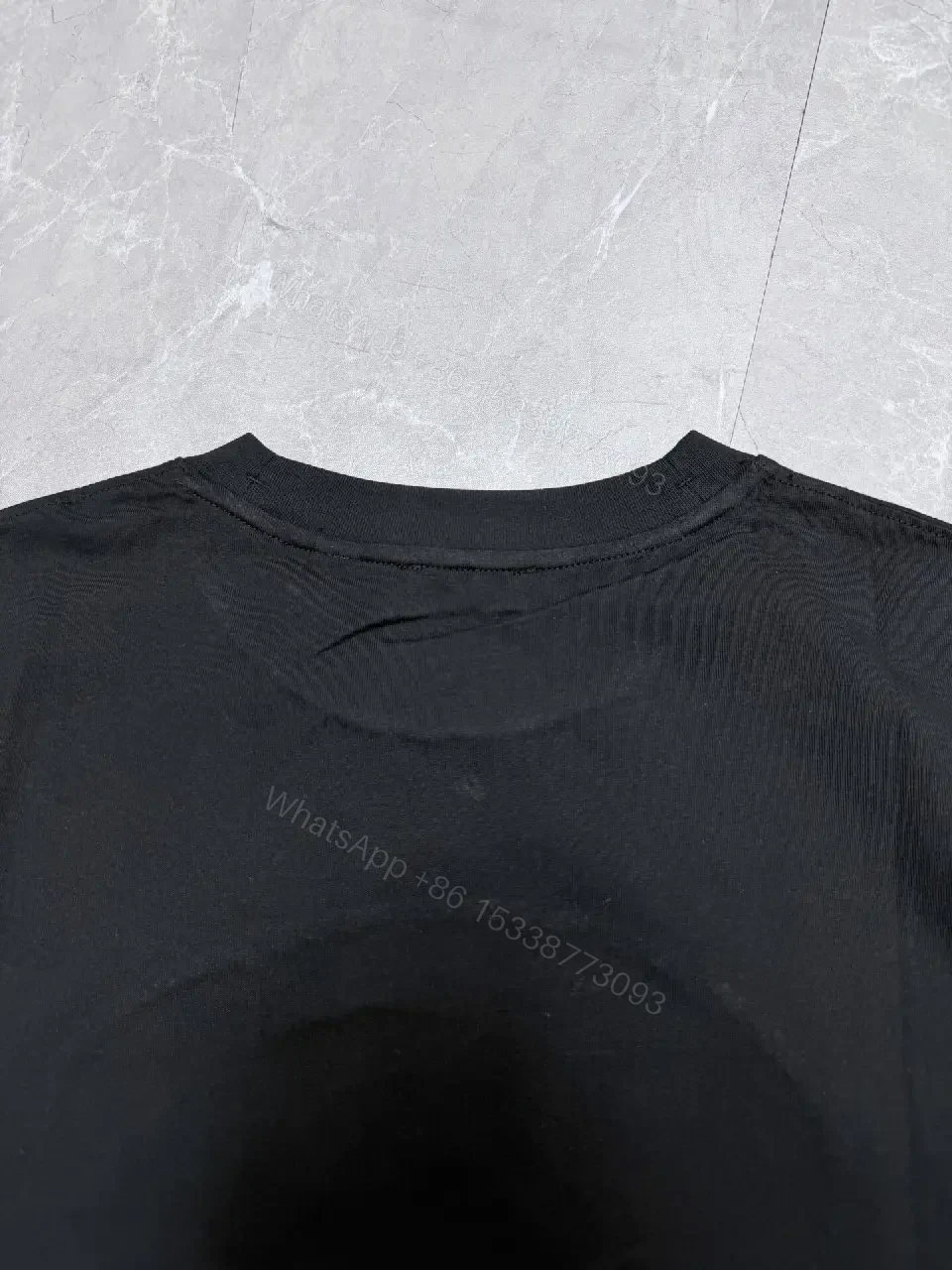 View 10 of Bold Black Cotton Tee, Subtle Luxe Details, Casual Confidence Tee