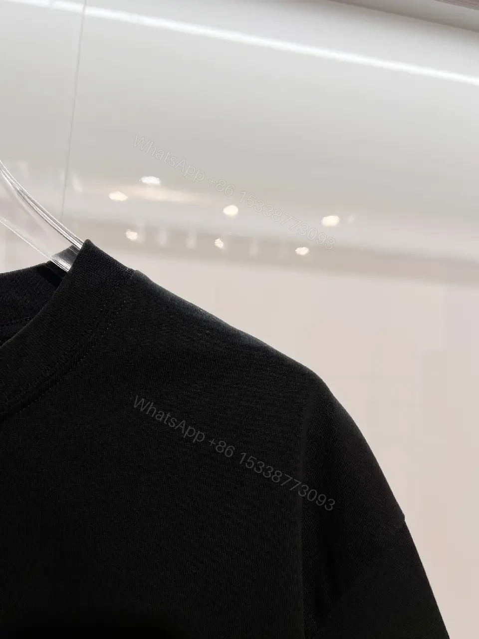 View 8 of Black Cotton Tee Classic – Subtle Emblem, Everyday Luxe