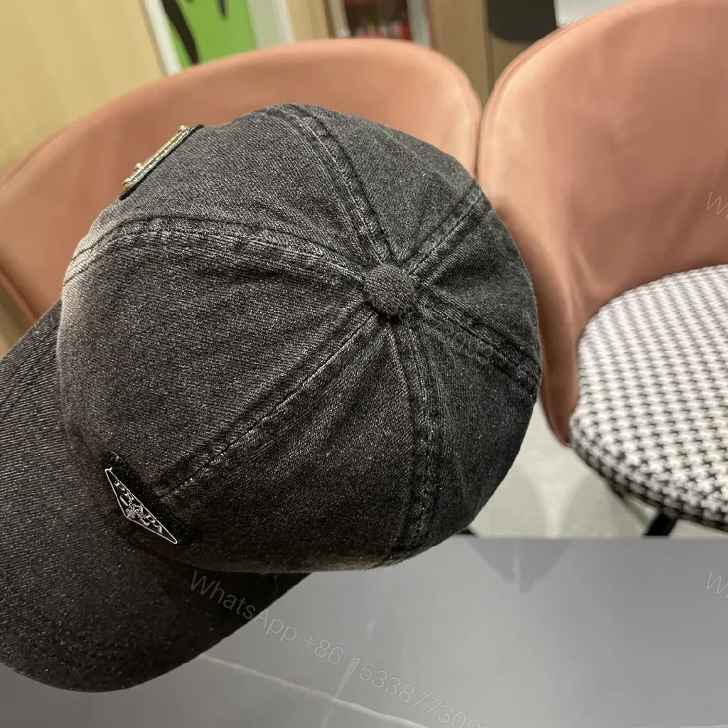 View 2 of Black Denim Cap with Subtle Triangle Emblem