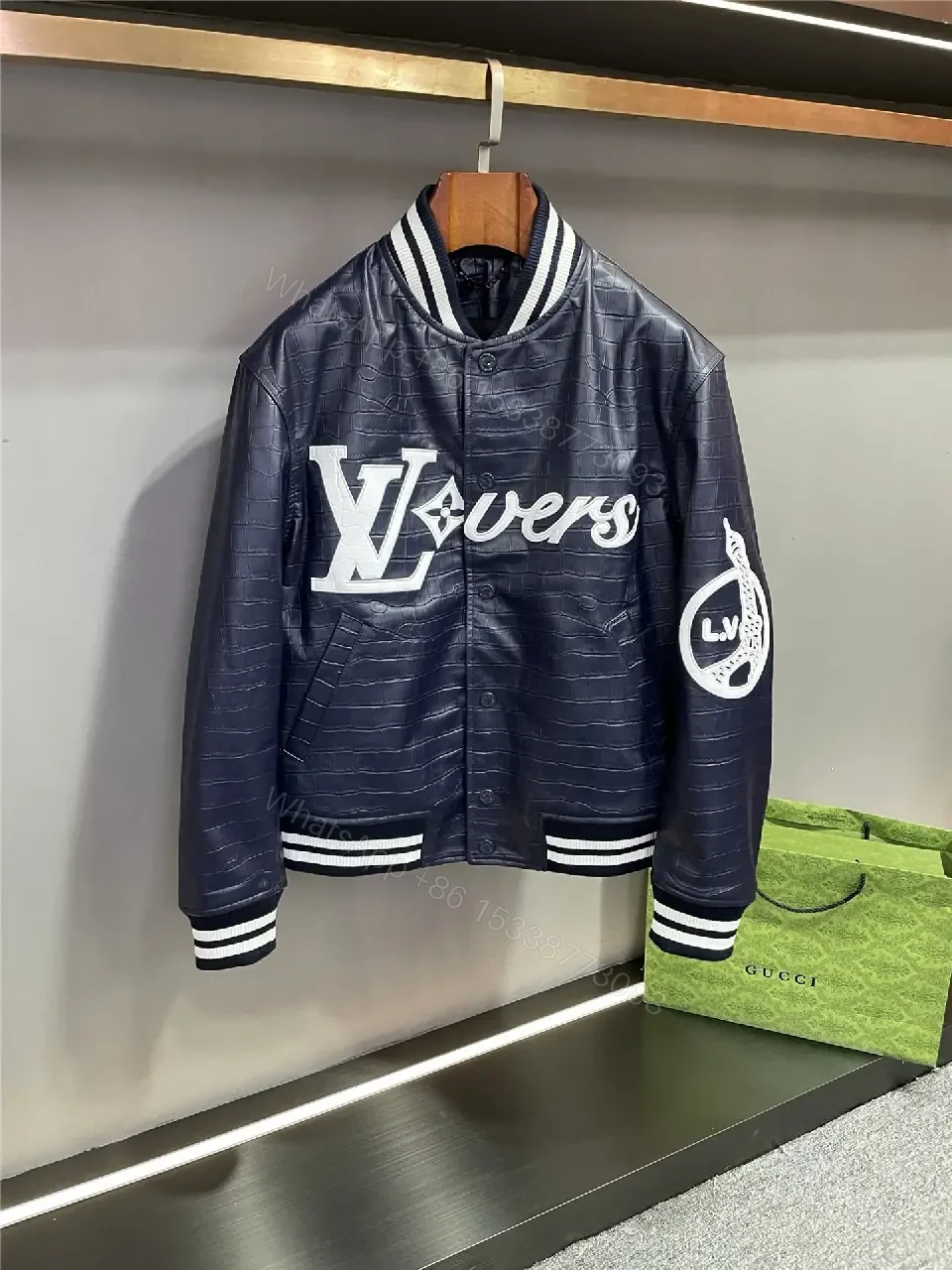 View 11 of Bold Navy Quilted Varsity Jacket with LV-Inspired Logo