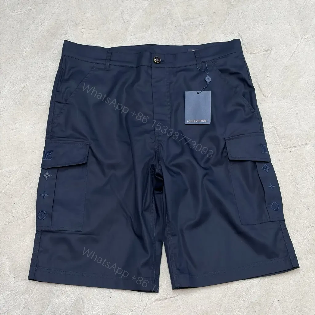 View 8 of Navy Cargo Shorts with Louis Vuitton Logo Embossed Key Features Short