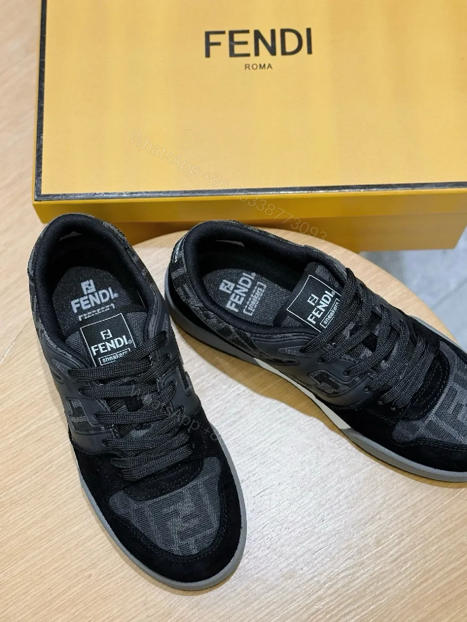 View 2 of Chic Monochrome Trainer: Signature Detailing, Everyday Luxury