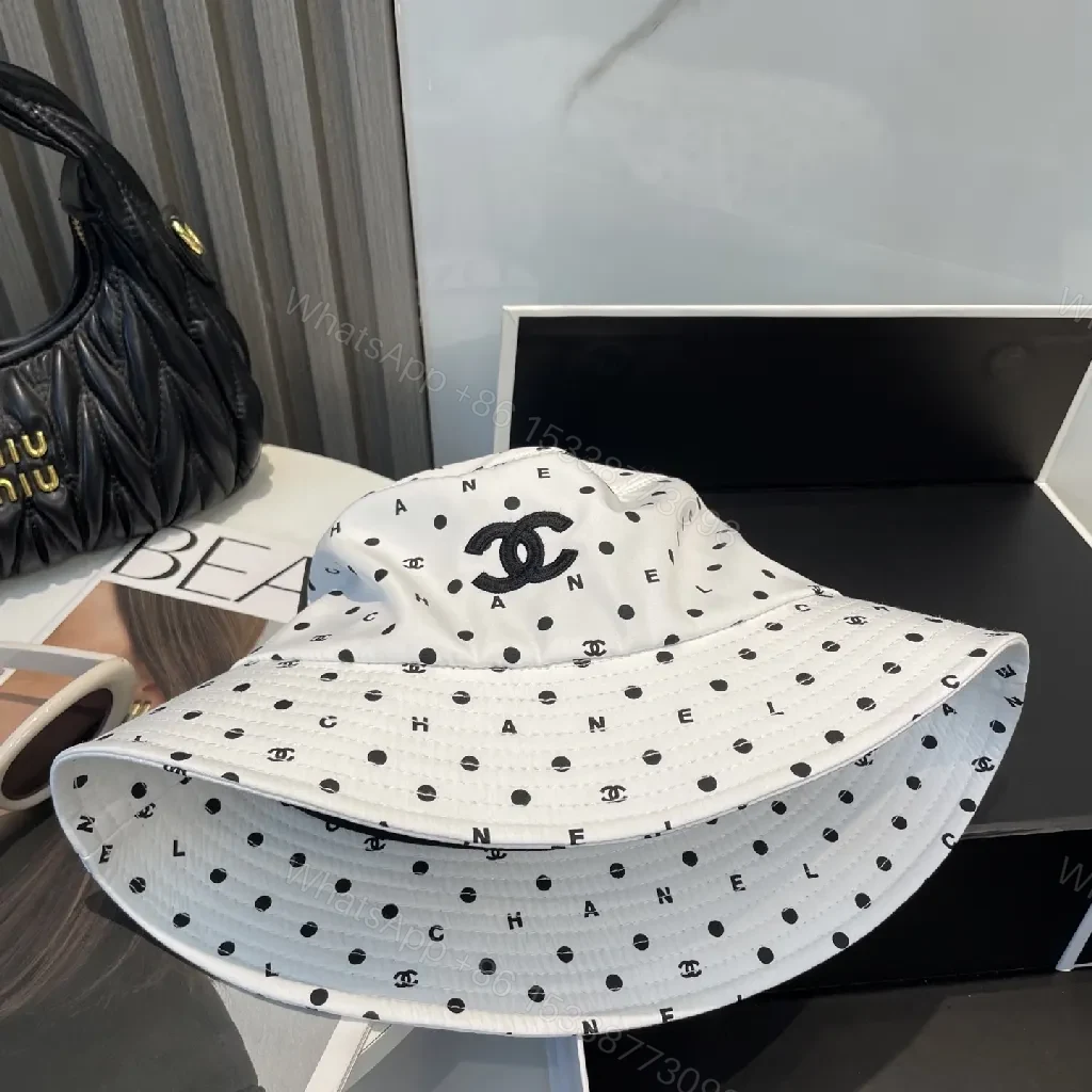 View 7 of White Polka Dot Bucket Hat with Subtle Logo, Cotton-Blend