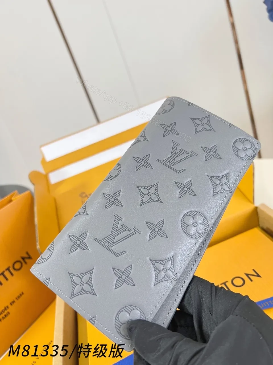 View 5 of Soft Gray Monogram Leather Wallet: Compact Luxury, Signature Detail