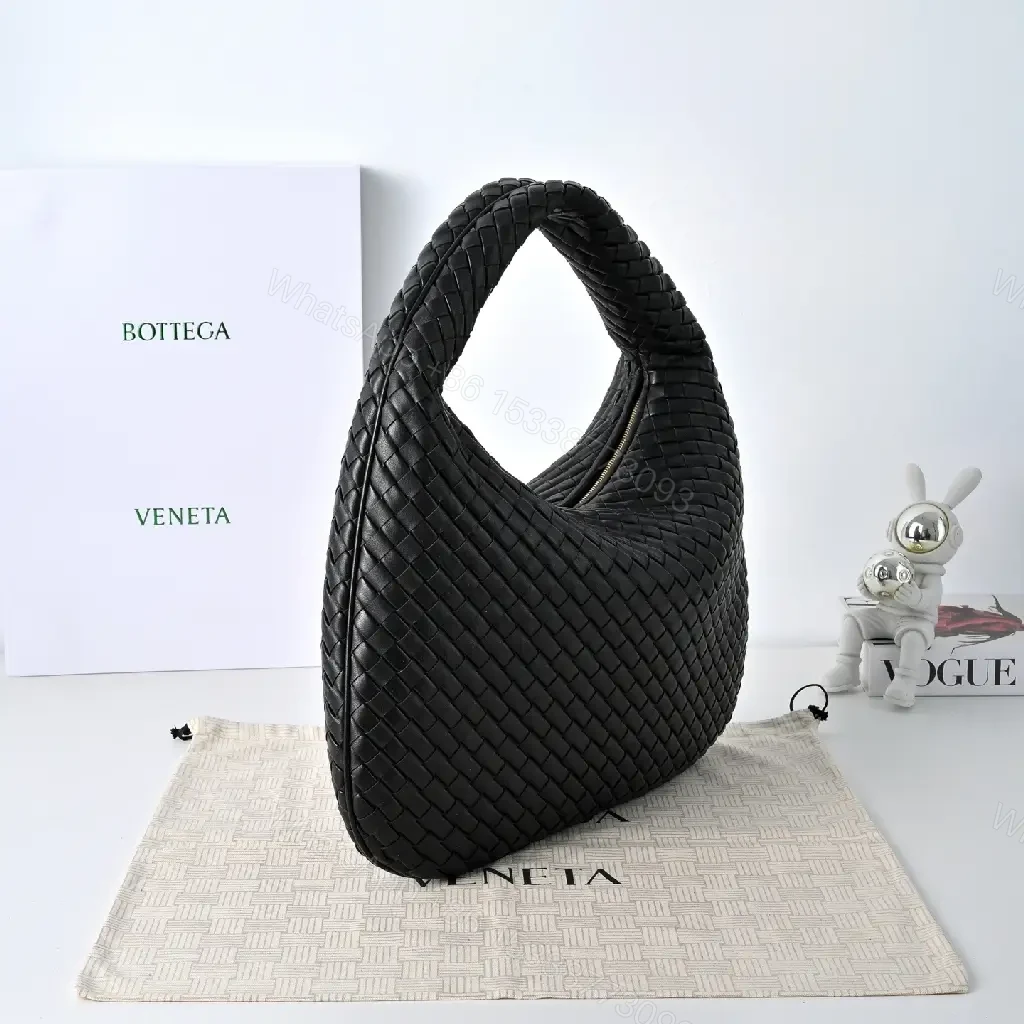 View 2 of Basketweave Handbag in Black – Premium Vegan Leather, Curved Handle, Compact Luxury Bag