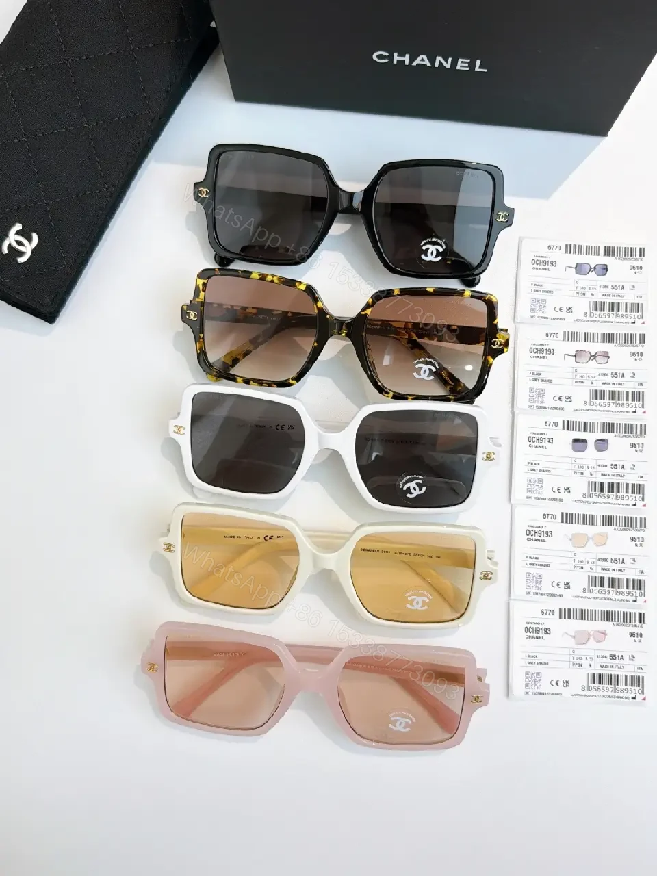 View 2 of Black Frame Oversized Sunglasses with Gold Chanel Logos, Matte Gray Lenses