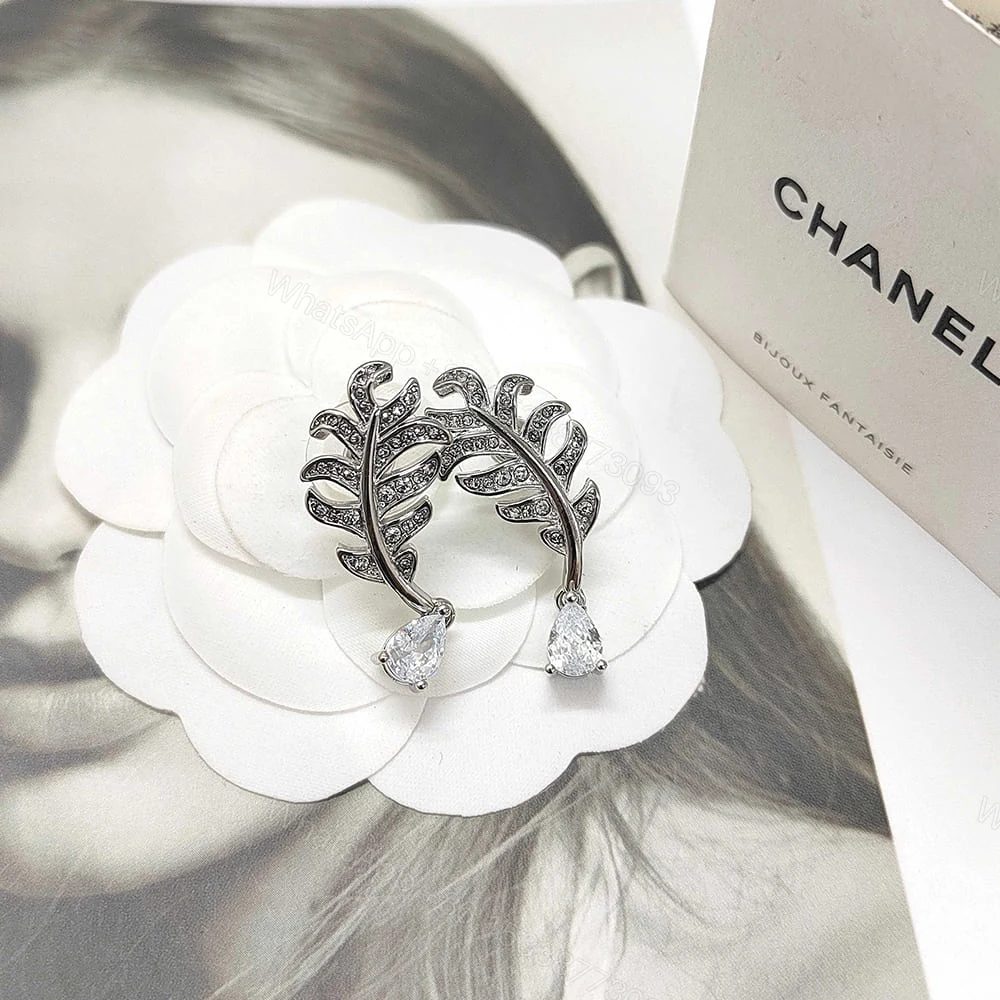View 3 of CHANEL PLUME DE CHANEL EARRINGS