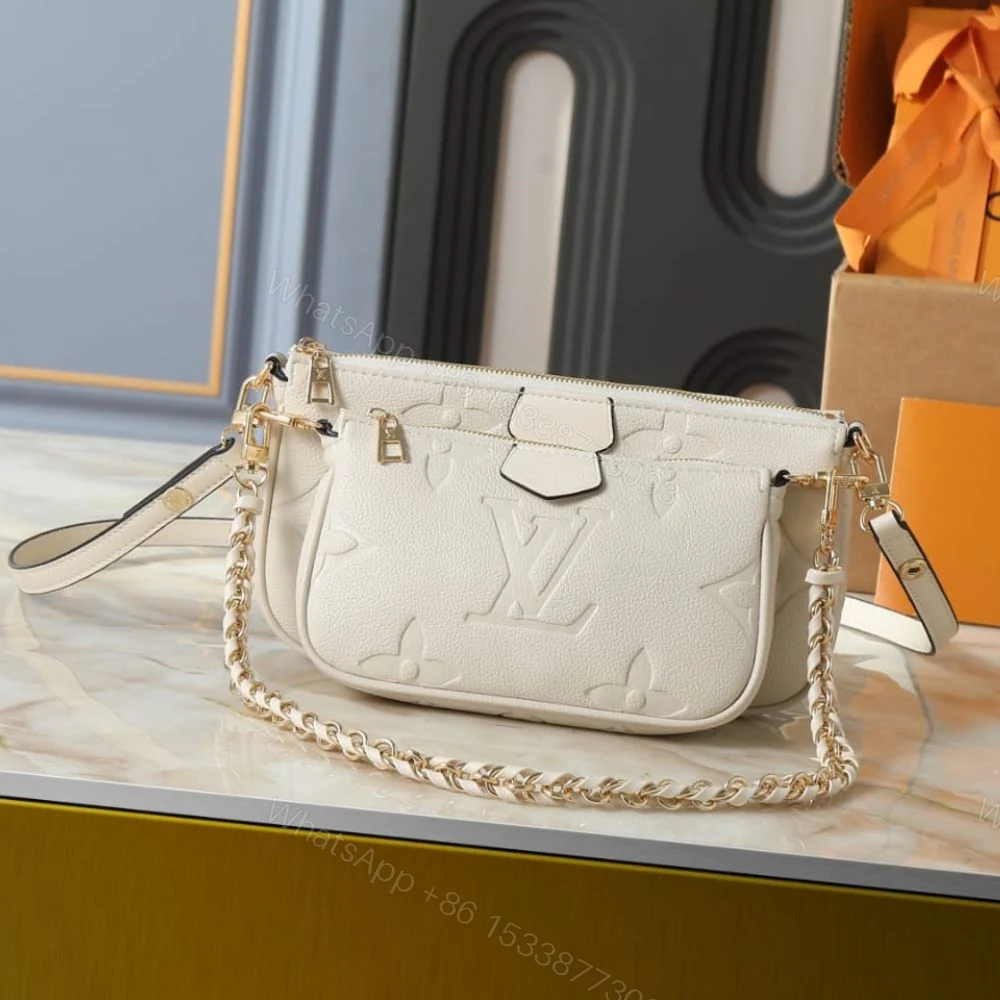 View 2 of Louis Vuitton Multi Pochette Accessoires Monogram Empreinte Cream 25Cm