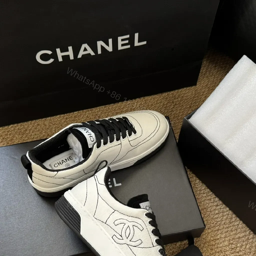 View 6 of Chic Leather High-Top Sneaker with Couture Detailing