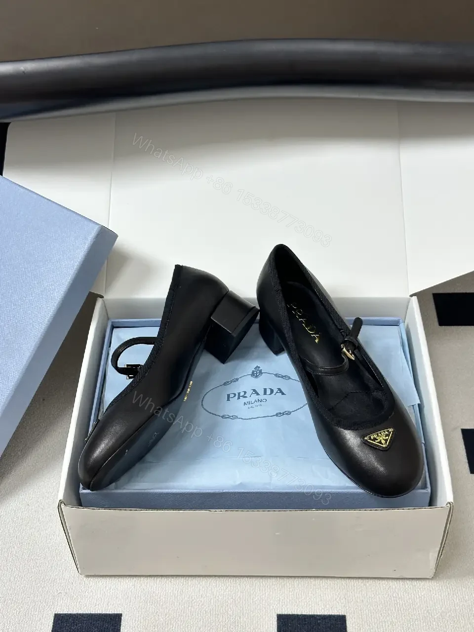 View 3 of Black Leather Mary Jane Heels with Logo Charm, Prada Style