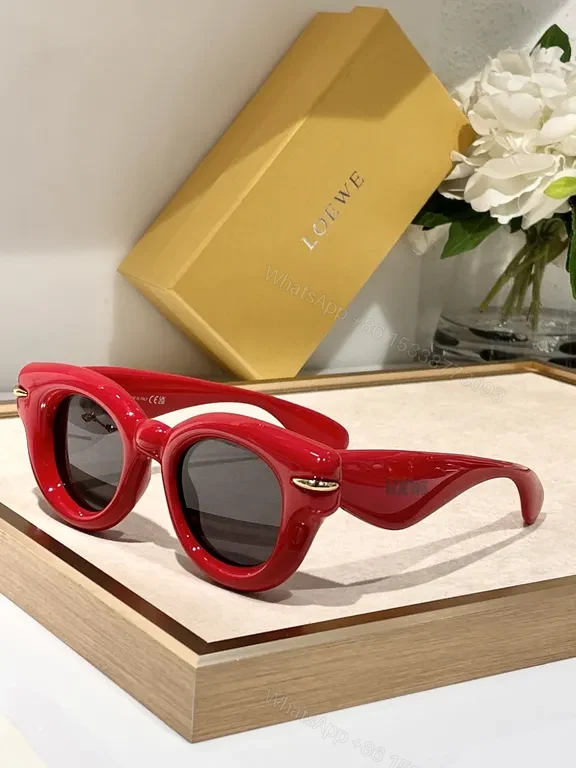 View 8 of Statement Pink Designer Sunglasses: Loewe, UV400, Stylish Comfort