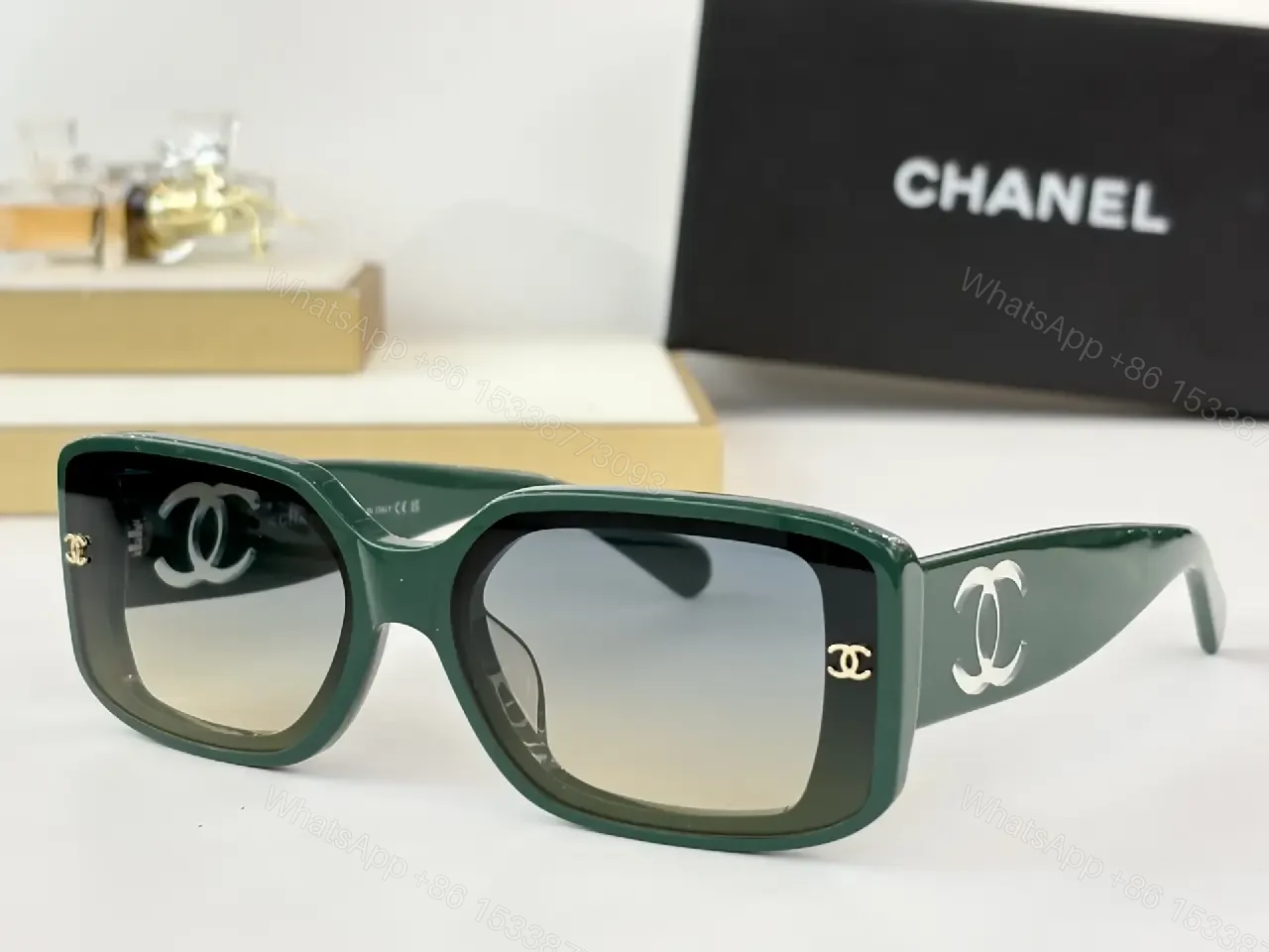 View 7 of Bold Black Acetate Rectilinear Sunglasses, Gold Accents, UV400 Protection