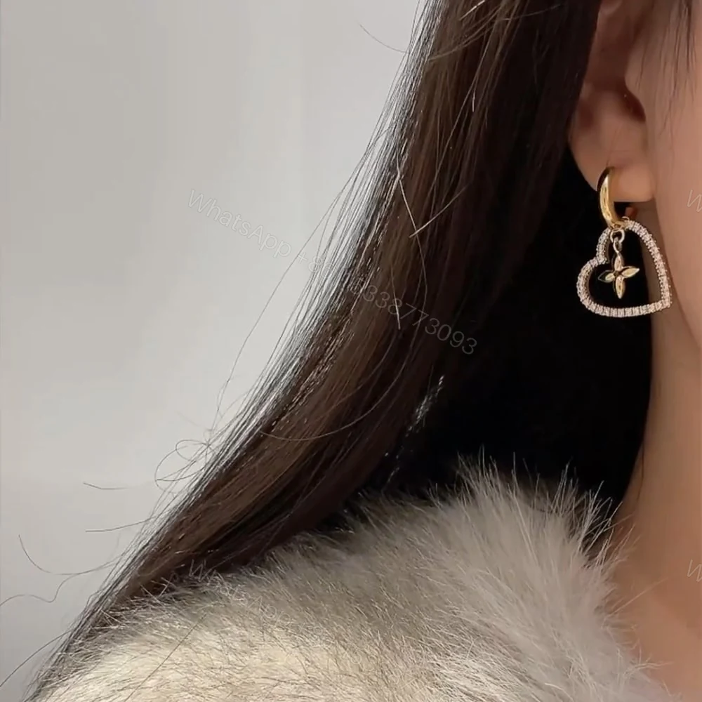 View 6 of LOUIS VUITTON HEART EARRINGS WHITE M02308
