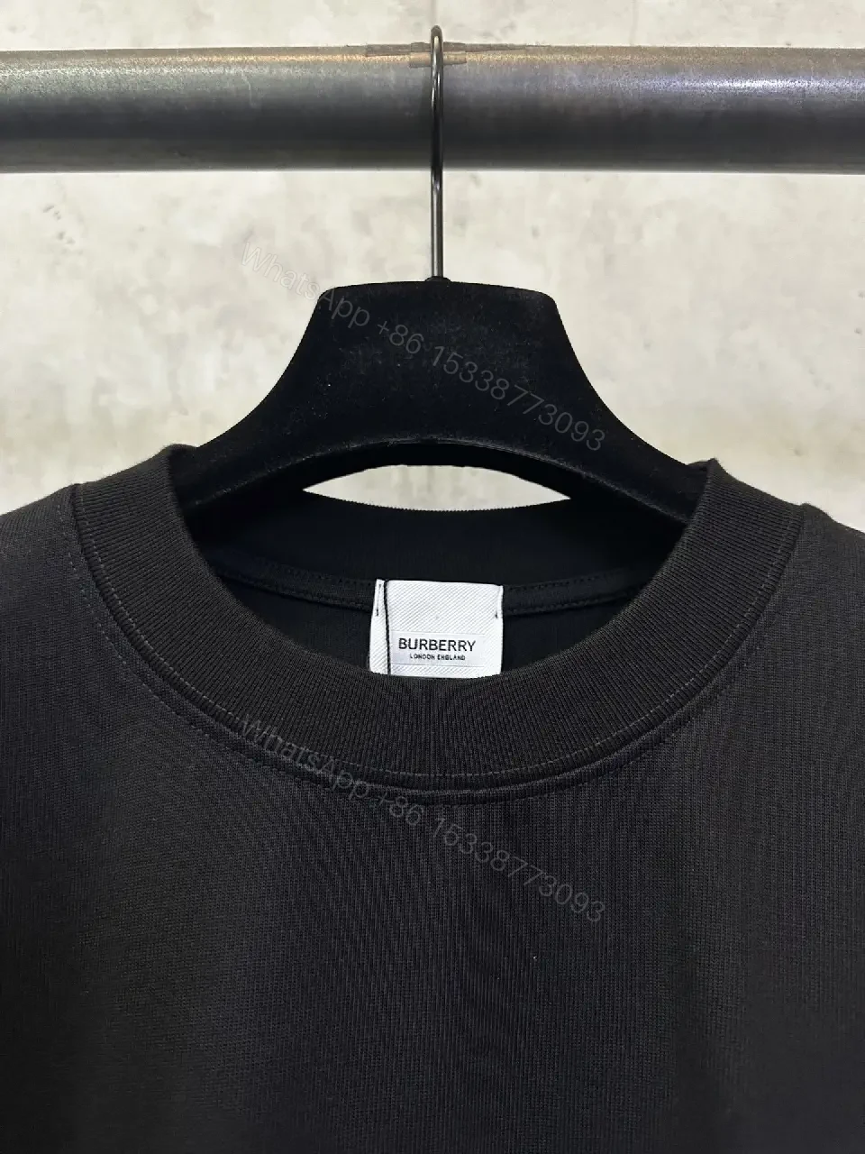 View 4 of Oversized Black Logo Cotton Tee – Modern Streetwear Essential
