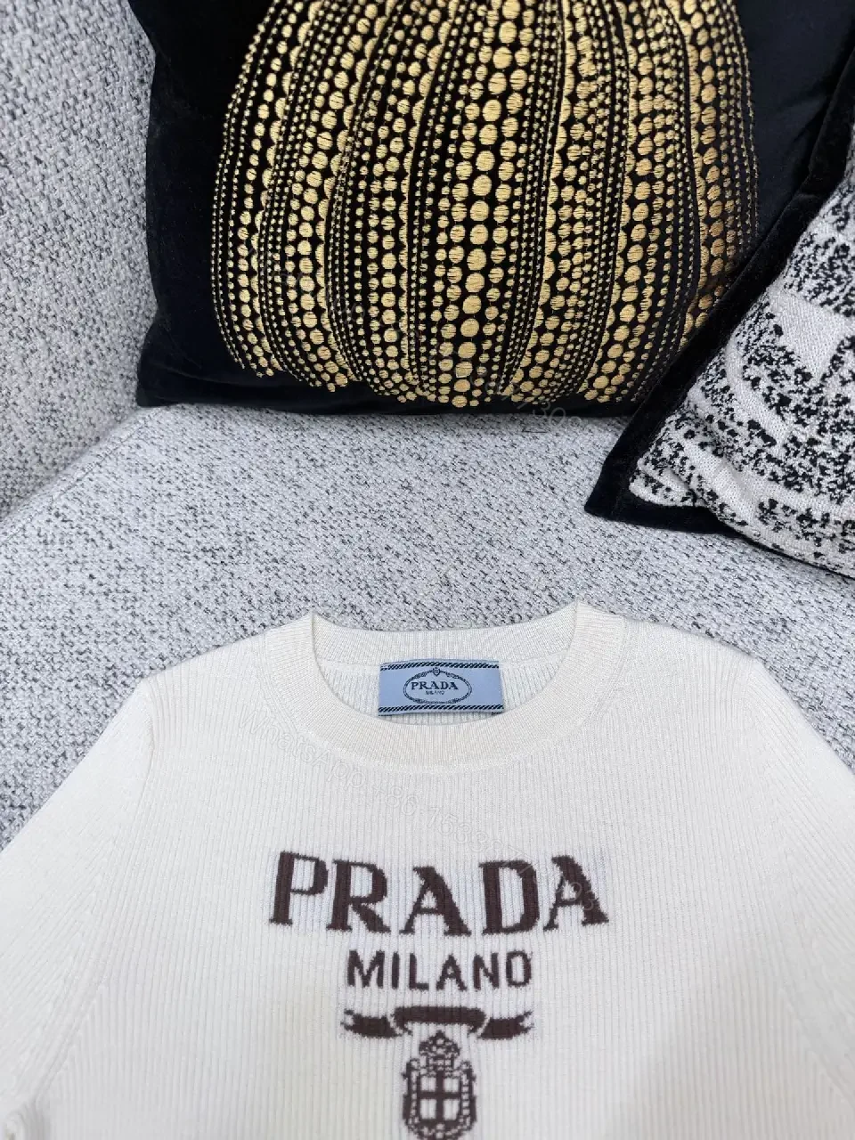 View 3 of Minimalist Ivory Knit Tee with Prominent Branding