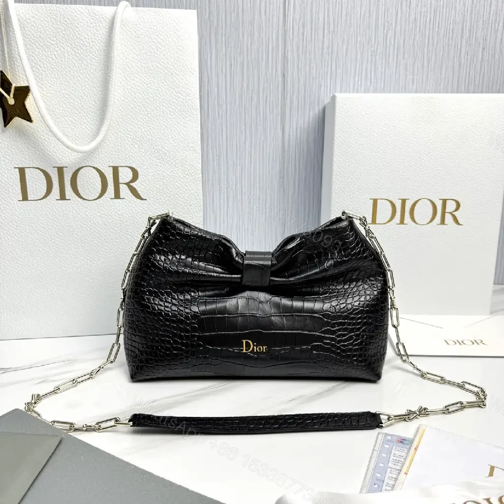 Croc-Texture Bow Clutch: Leather Luxury, All-Day Glam — view 1