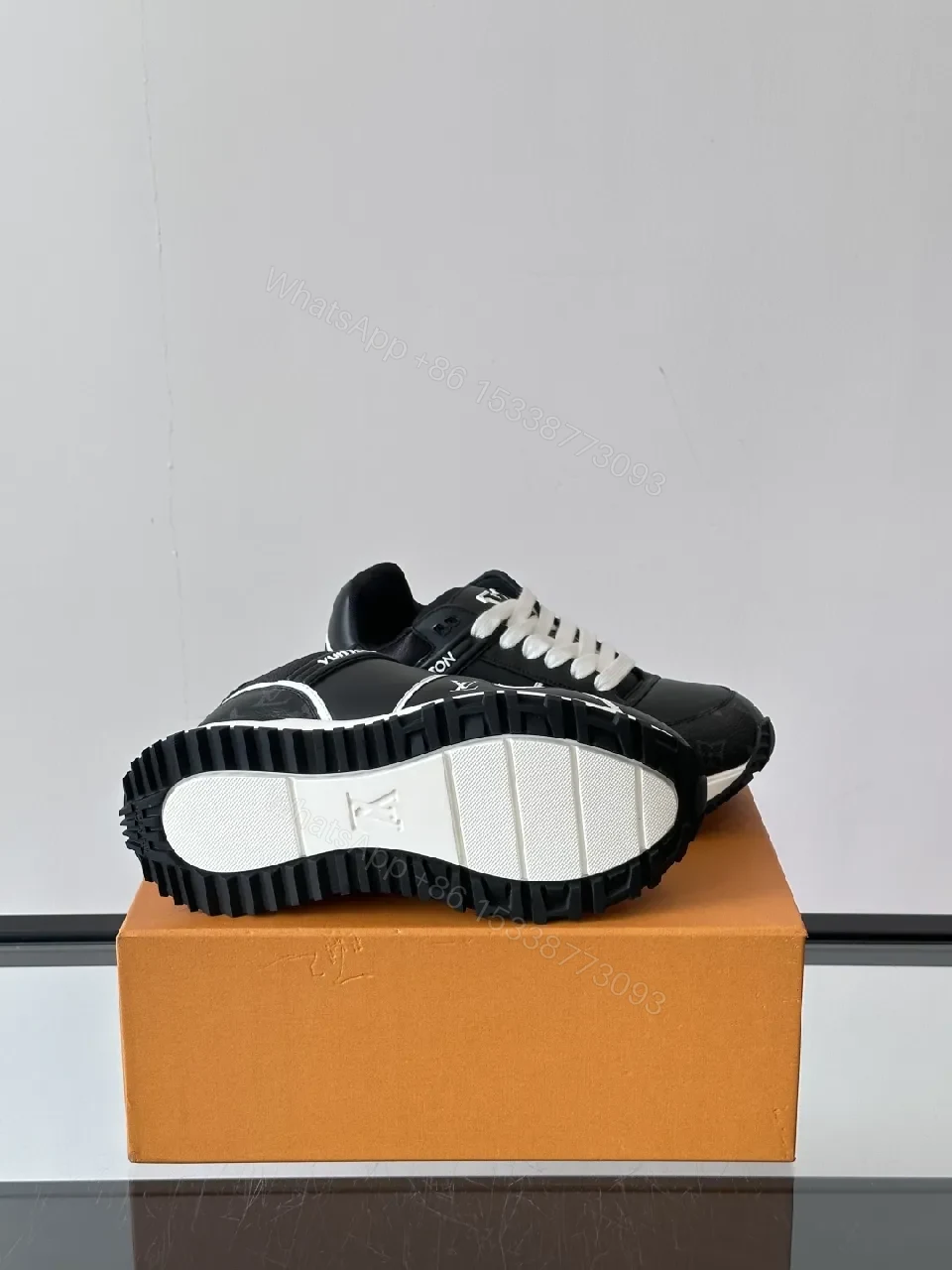 View 9 of Monochrome Luxe High-Top Sneaker with Premium Leather Comfort