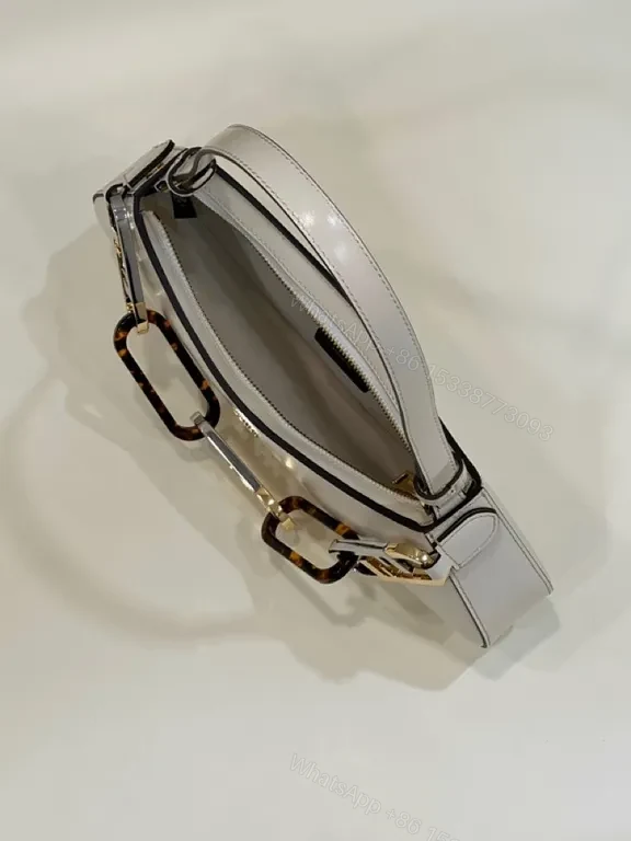 View 2 of Chic White Leather Handbag: Minimalist Fendi Hardware Elegance