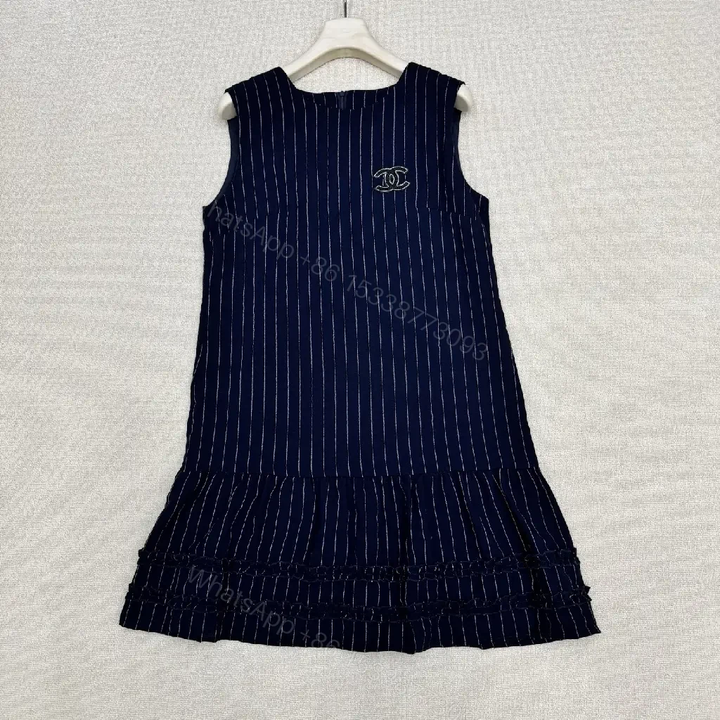 View 2 of Navy Pinstripe Cotton A-Line Dress with Chanel Logo Key Feature