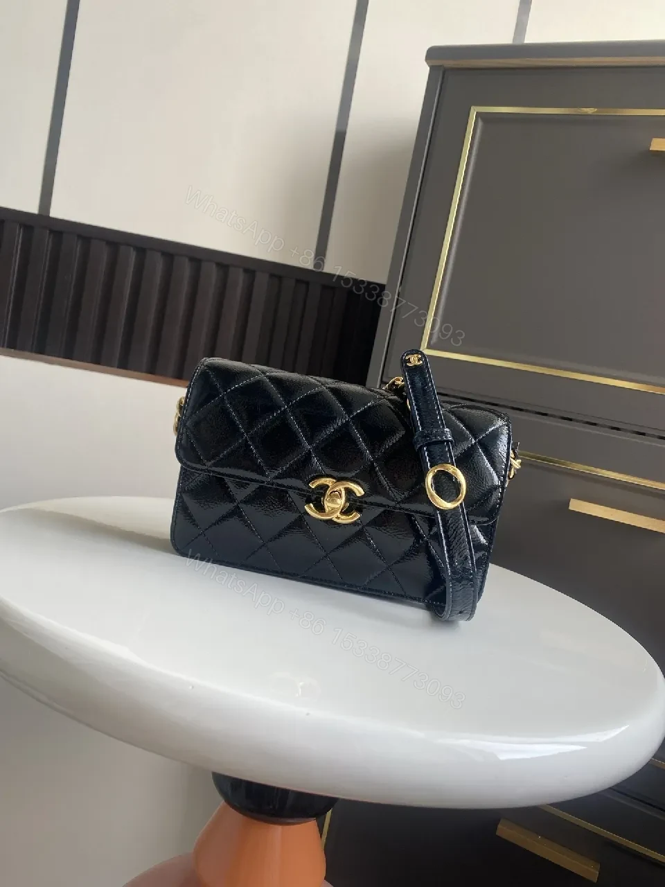 Quilted Black Leather Bag with Gold Hardware, Classic Style — view 1