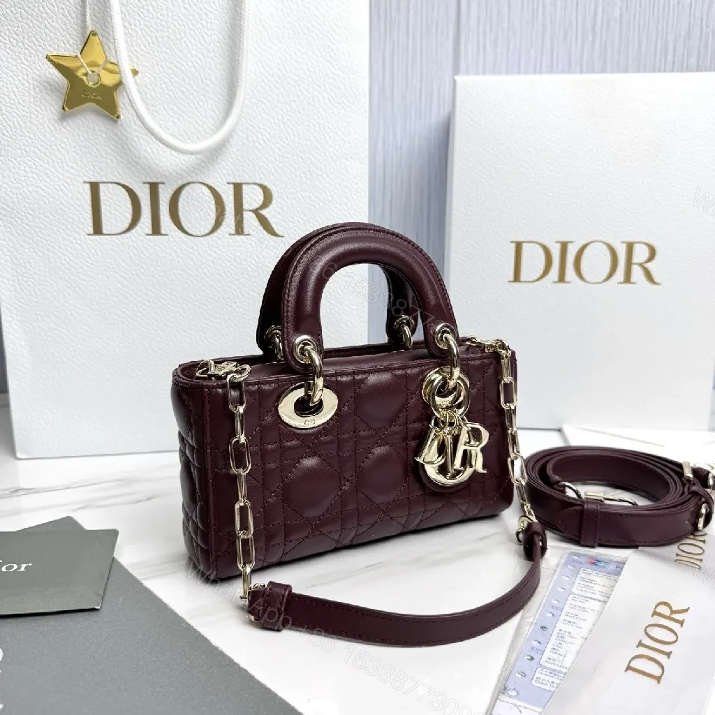 View 2 of Quilted Burgundy Calfskin Top-Handle Bag with Gold Accents
