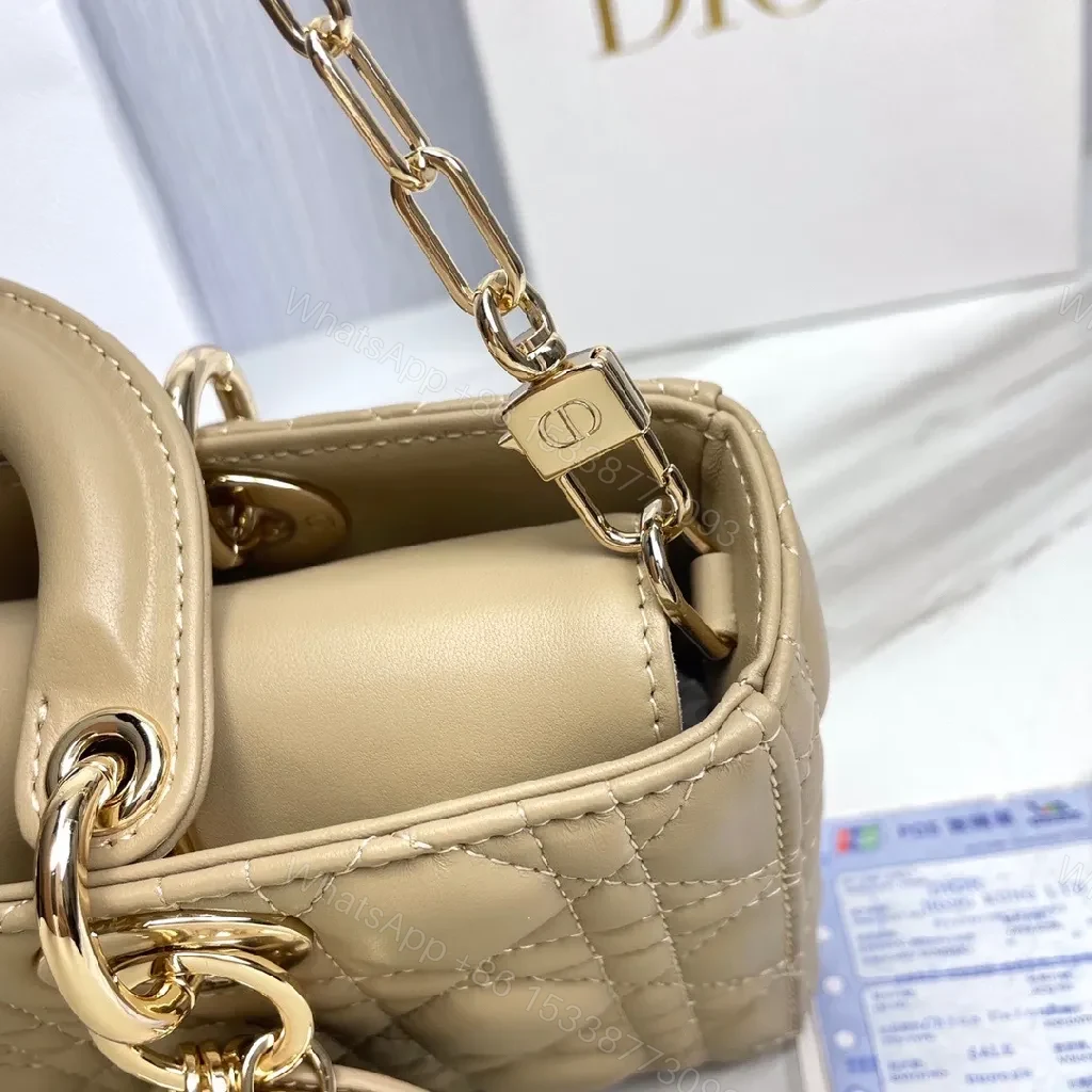 View 8 of Nude Calfskin Quilted Mini Handbag—Top Handle, Dior Hardware