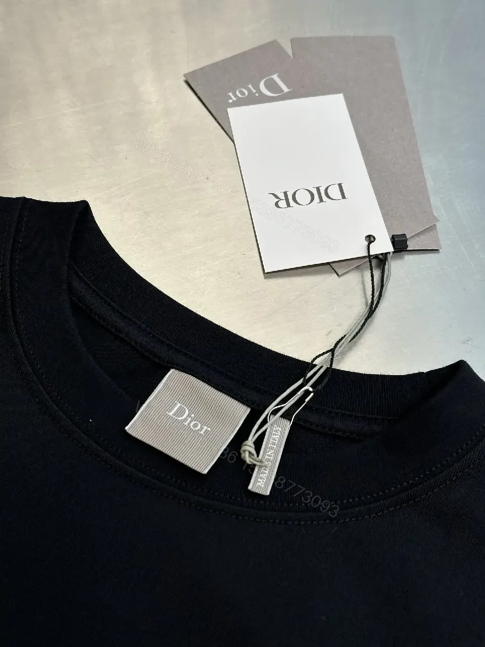 View 3 of Minimalist Black Cotton Tee: Subtle Dior-Inspired Luxury Knit