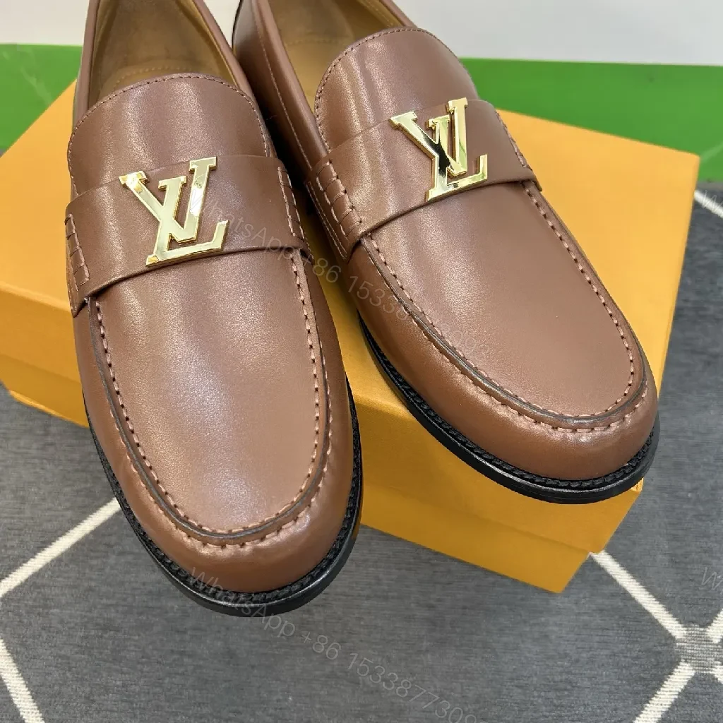 View 2 of Brown Leather Loafers with Gold Emblem: Luxury Everyday Comfort