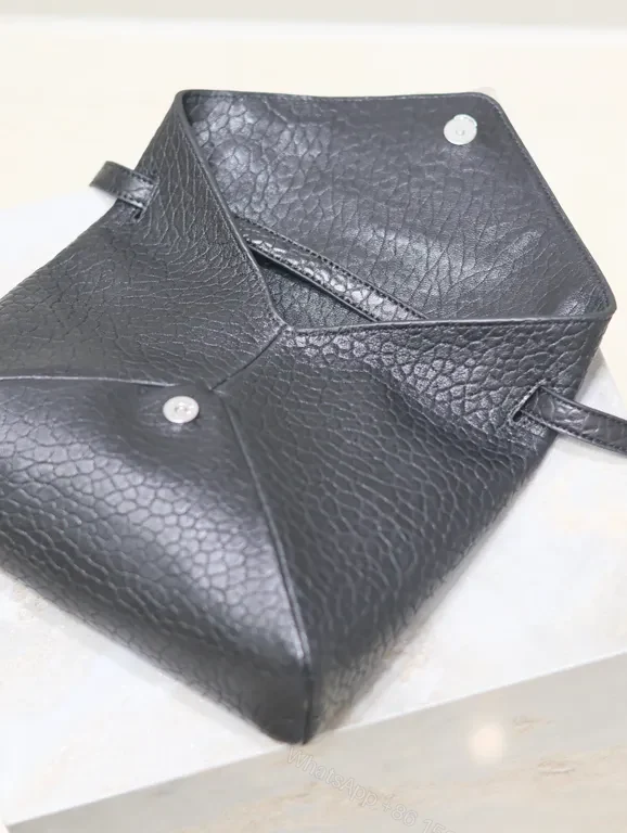 View 4 of Pebble Leather Crossbody: YSL Hardware, Modern Chic, Compact Luxury Bag