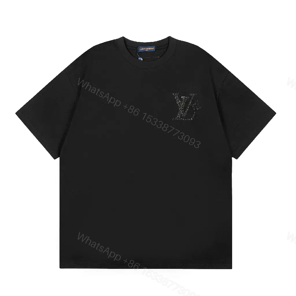 View 6 of Minimalist Black Cotton Tee with Subtle Monogram Detail - Everyday Luxury