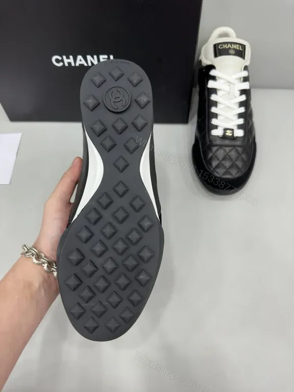 View 6 of Chanel-Quilted Leather High-Top Sneakers with Signature Details