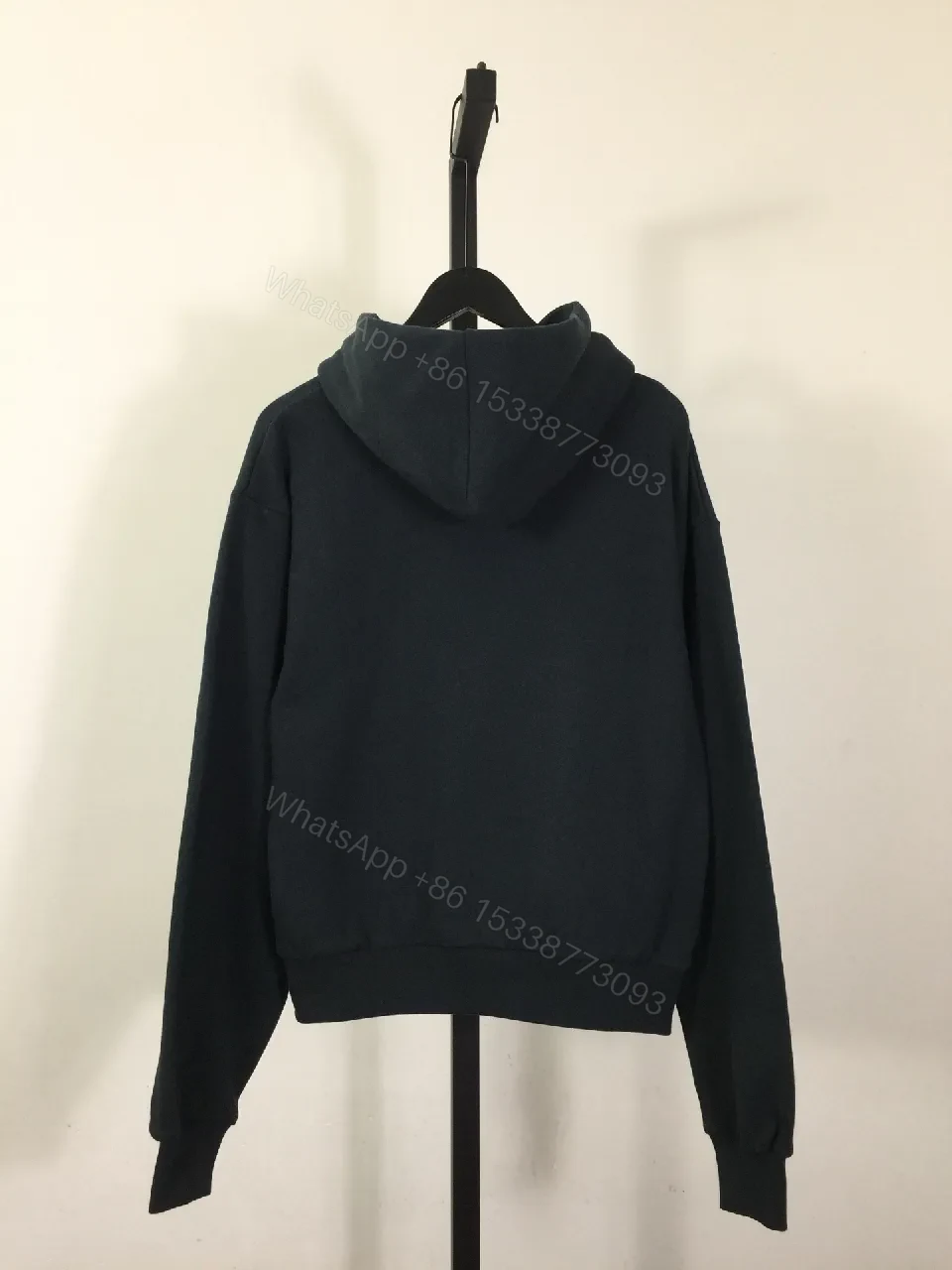 View 4 of White-on-Black Luxury Hoodie with Scripted Logo