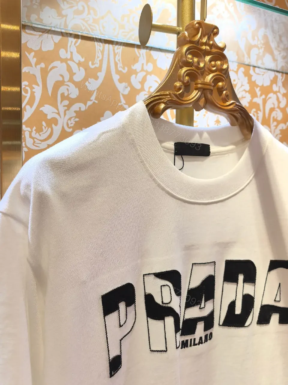 View 5 of White Cotton Crew Tee, Minimalist Luxe, PRADA Milano Logo Tee