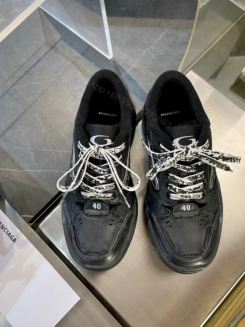 View 2 of All-Black Leather High-Top Sneaker with Bold Accents