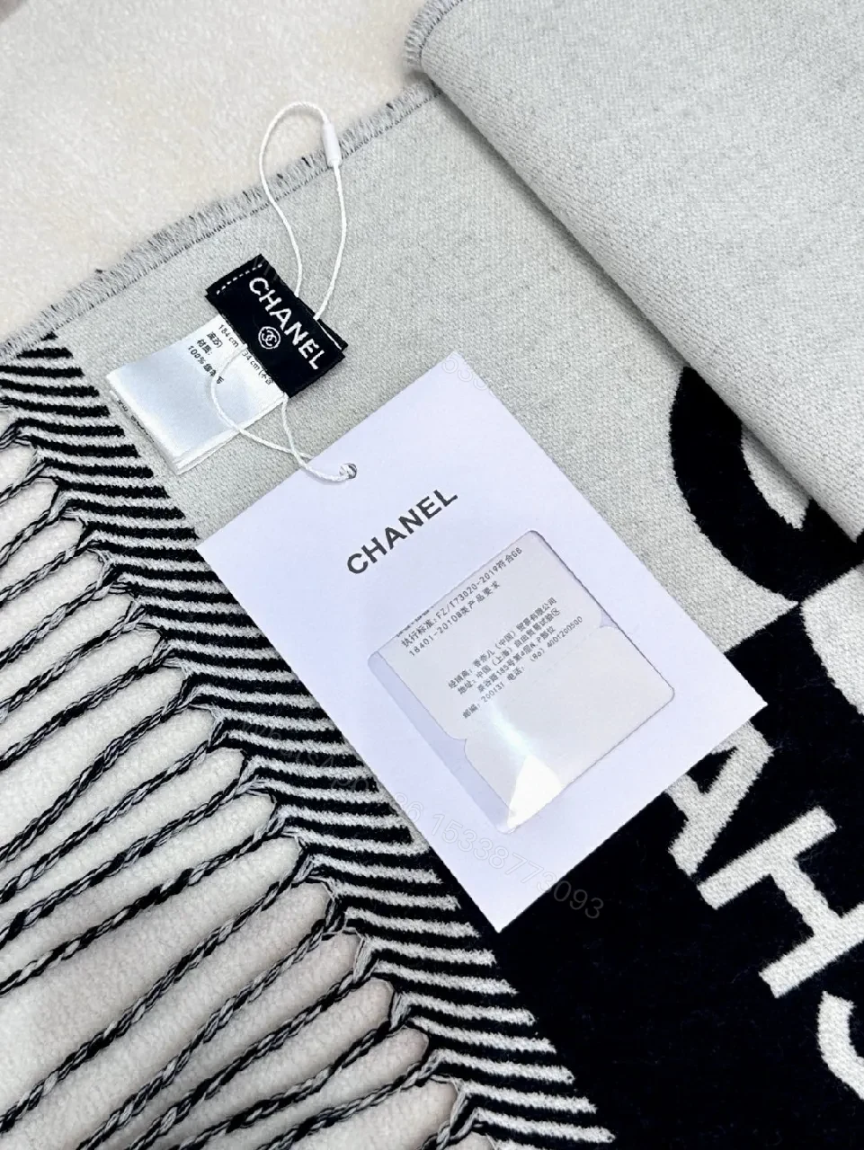 View 2 of Black-White Luxe Throw Scarf: Bold Contrast Weave, Fringe Edge