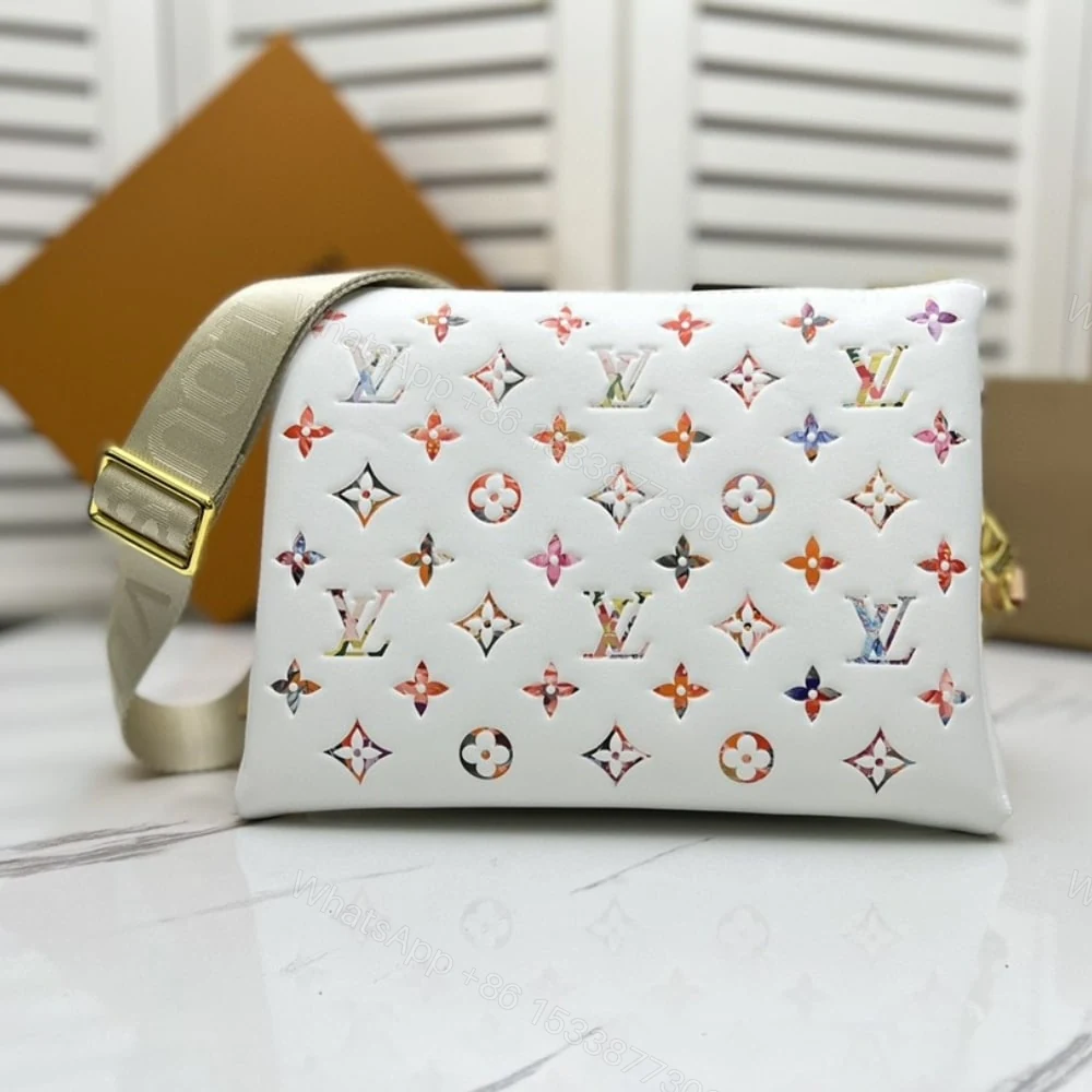 View 3 of Louis Vuitton Bolso Coussin PM White 26Cm M21209