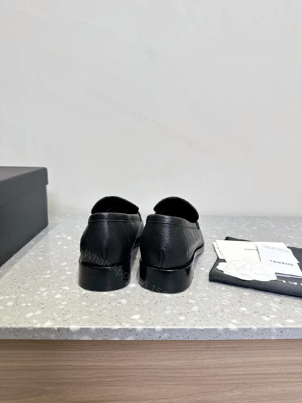 View 3 of Black Leather Slip-On with Logo Strap – Modern Luxe Comfort