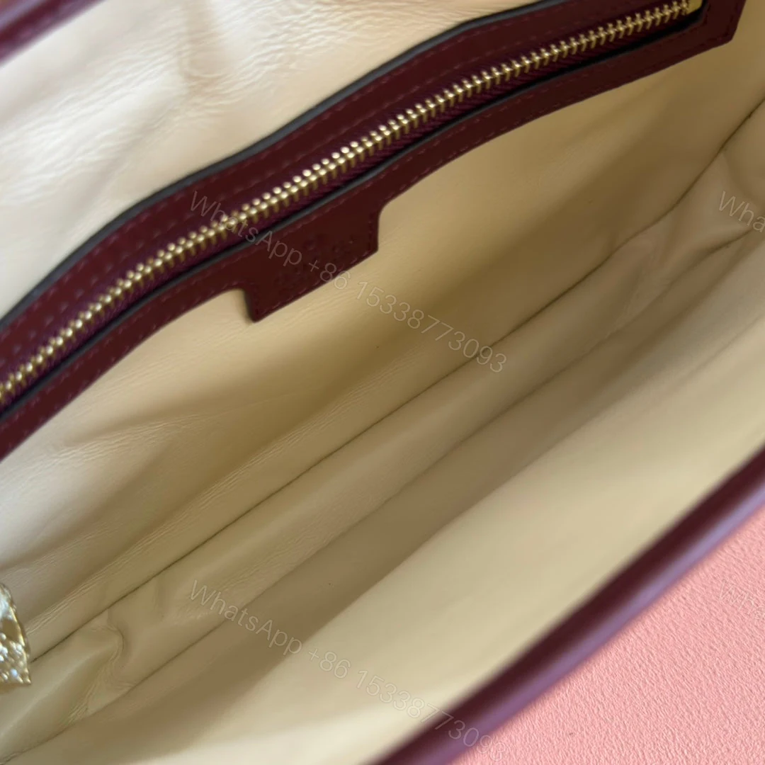 View 7 of JACKIE SMALL SHOULDER BAG 27 IN BURGUNDY RED CALFSKIN GOLD HARDWARE