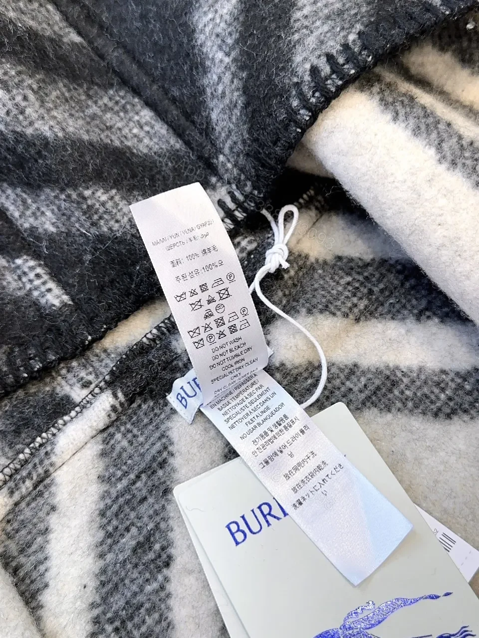 View 8 of Patterned Wool Hoodie Shawl: Luxe Plaid, Warmth & Zippered Edge