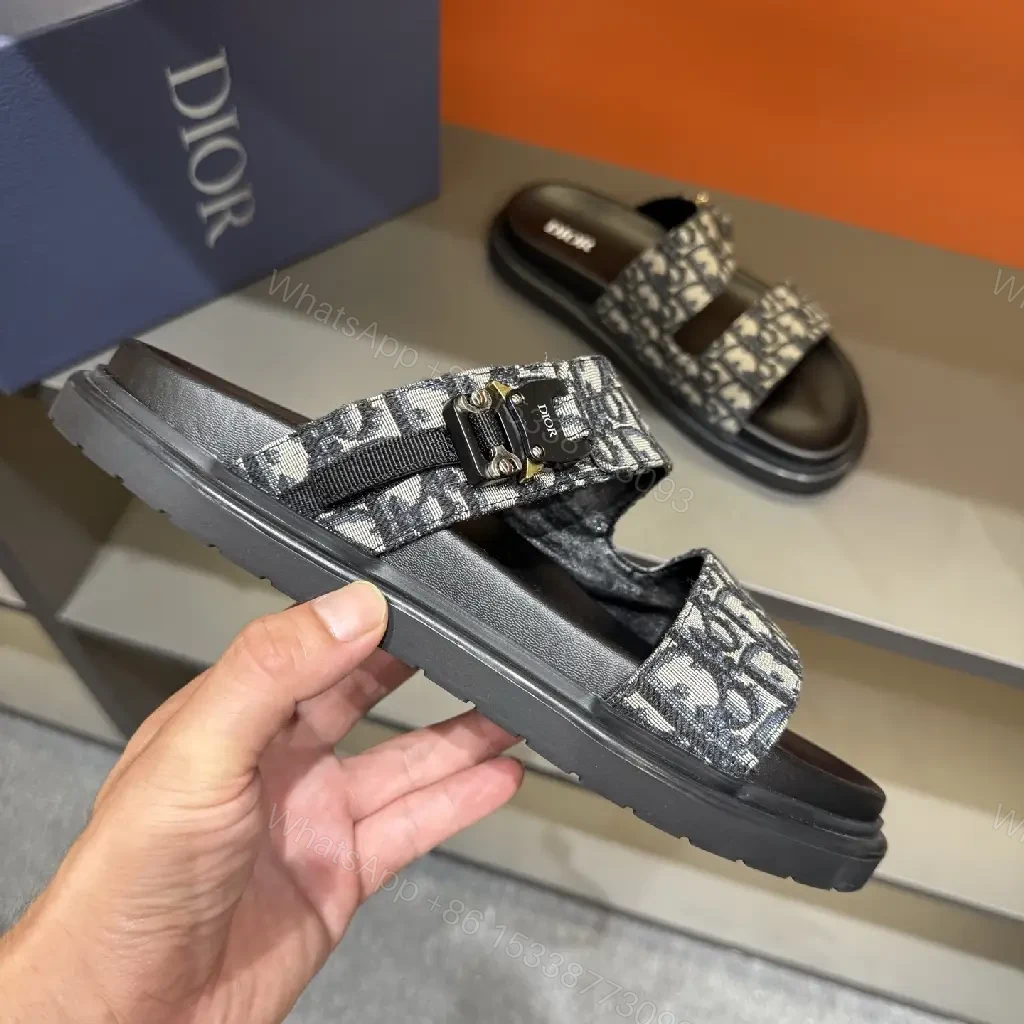 View 8 of Monochrome Monogram Slides: Sleek Signature Details