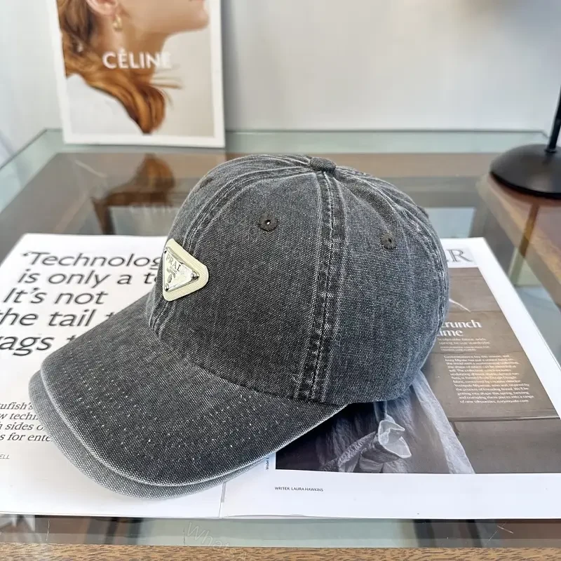 Washed Dark Gray Denim Cap, Curved Brim, Distressed Texture, Prada Patch — view 1