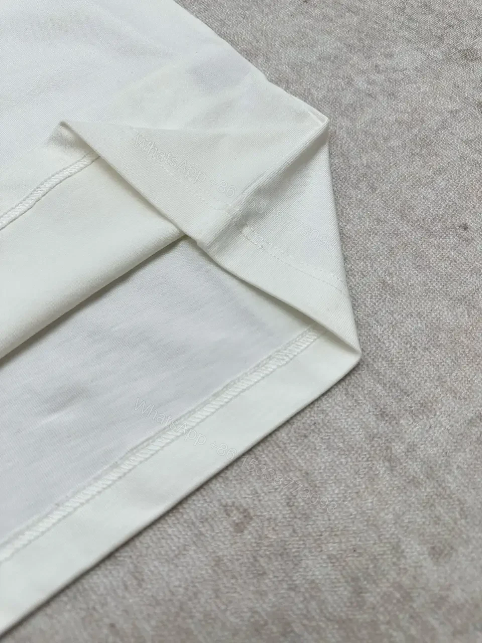 View 7 of Minimalist Luxe White Crewneck with Subtle Embossed DetailTop
