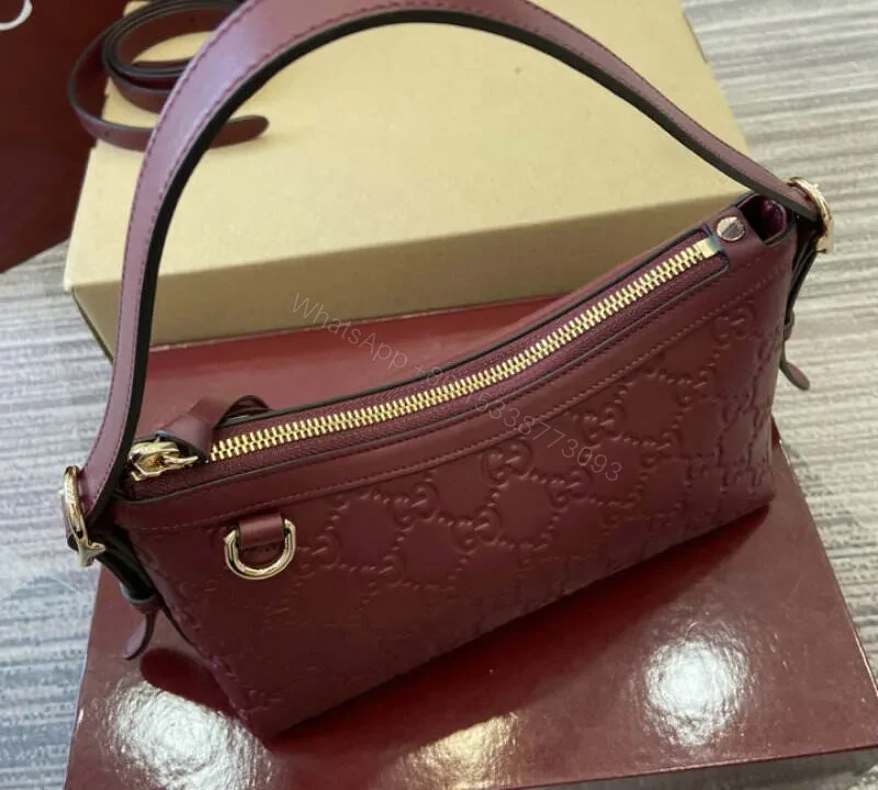 View 4 of Gucci GG Emblem Small Shoulder Bag – Rosso Ancora Red Leather