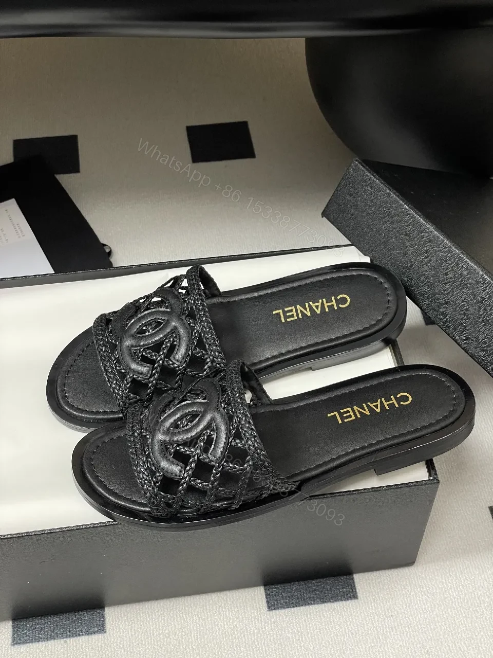 View 4 of Black Quilted Slide with Interlock Crest - Elevated Comfort Slipper