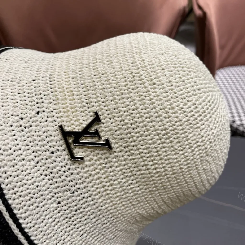 View 10 of Chic Straw Bucket Hat with Subtle Luxury Accent