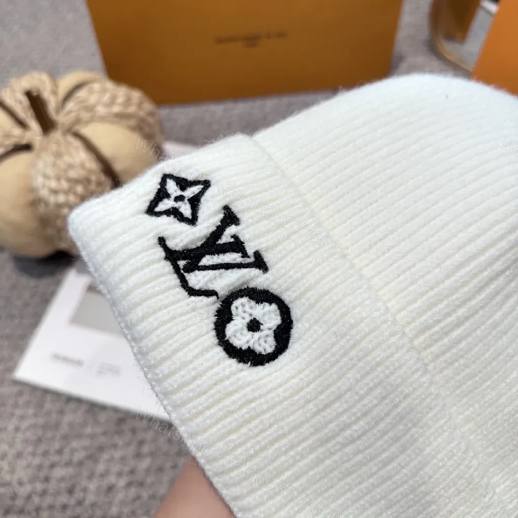 View 9 of White Knit Beanie – Luxe Logo Detail, All-Season Comfort