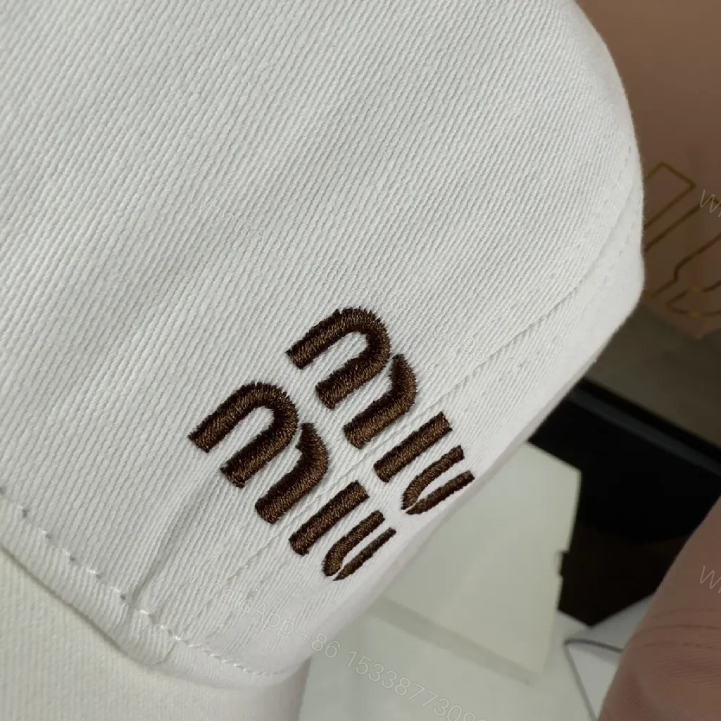 View 6 of Chic Cotton-Blend Cap: Minimalist Logo, Structured Brim